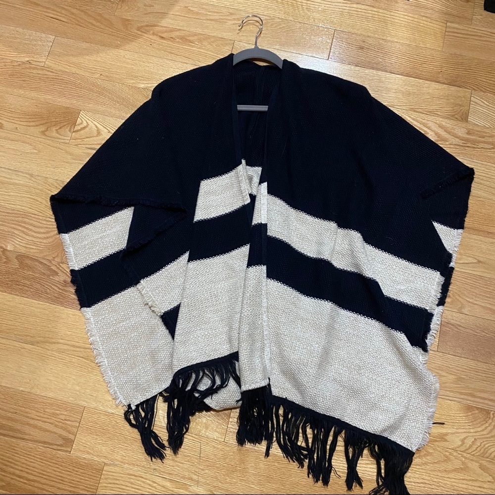 Stripped blue and tan knit poncho